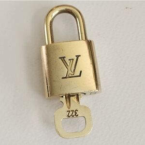 #322 Louis Vuitton Gold Lock and Key Set